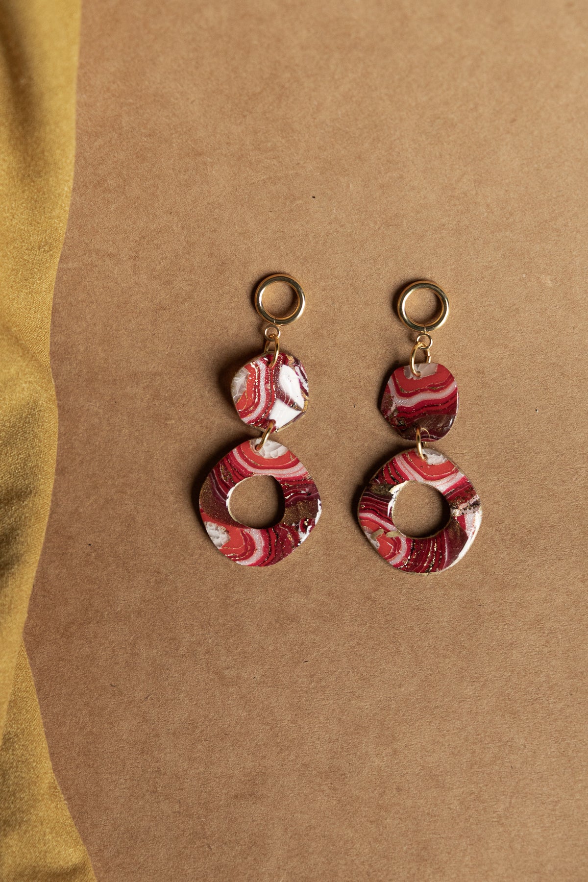 Oorbellen | Faux agate red rounds