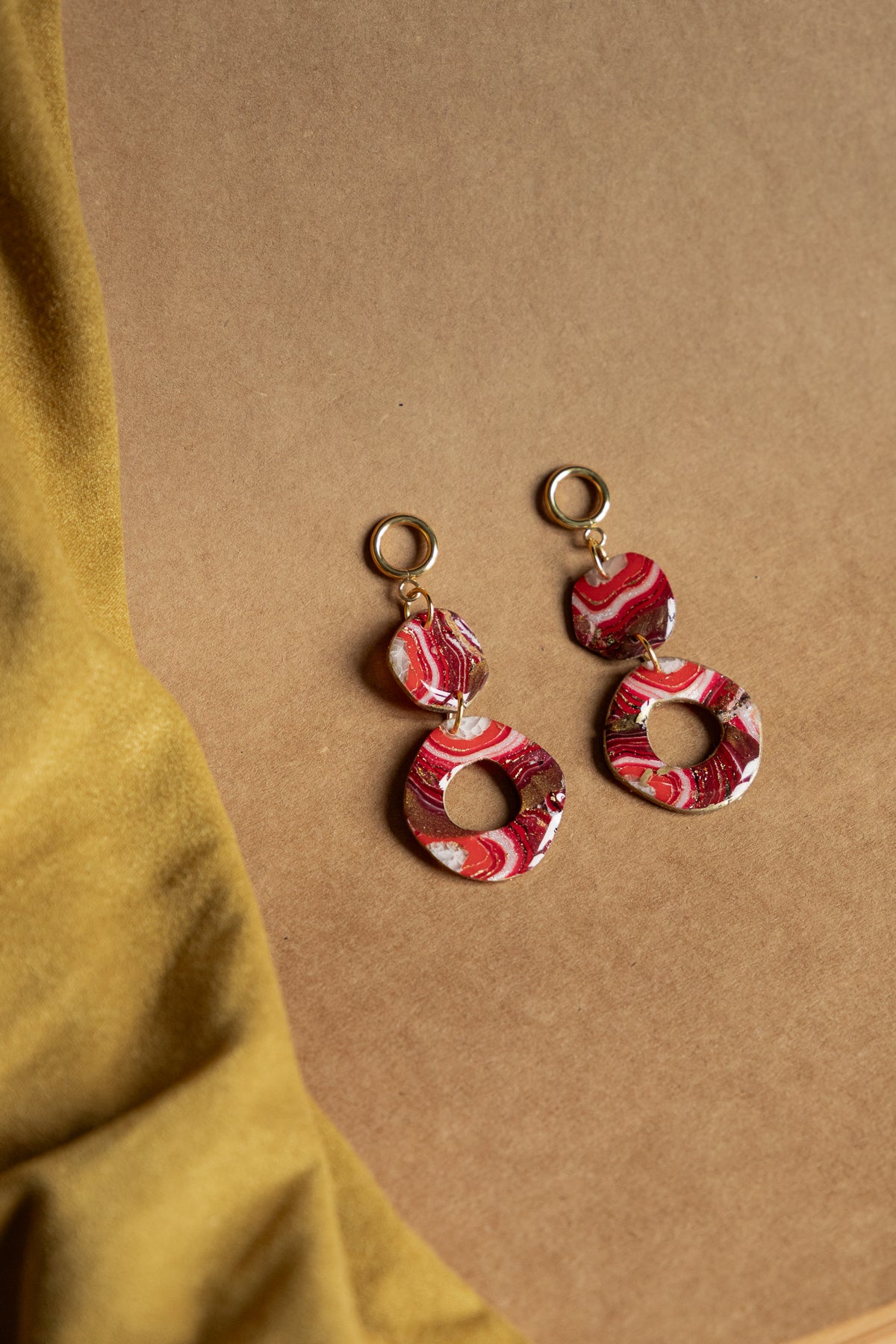 Oorbellen | Faux agate red rounds
