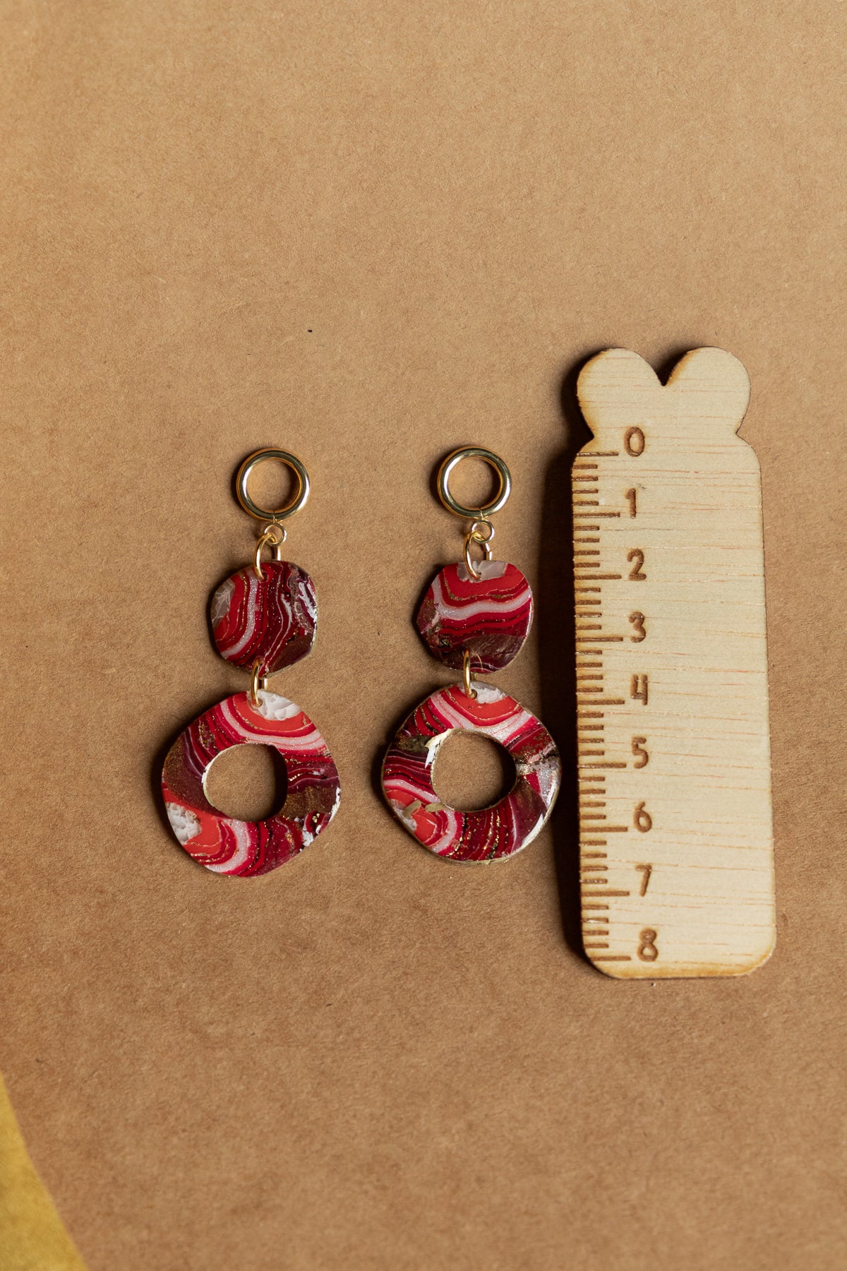 Oorbellen | Faux agate red rounds