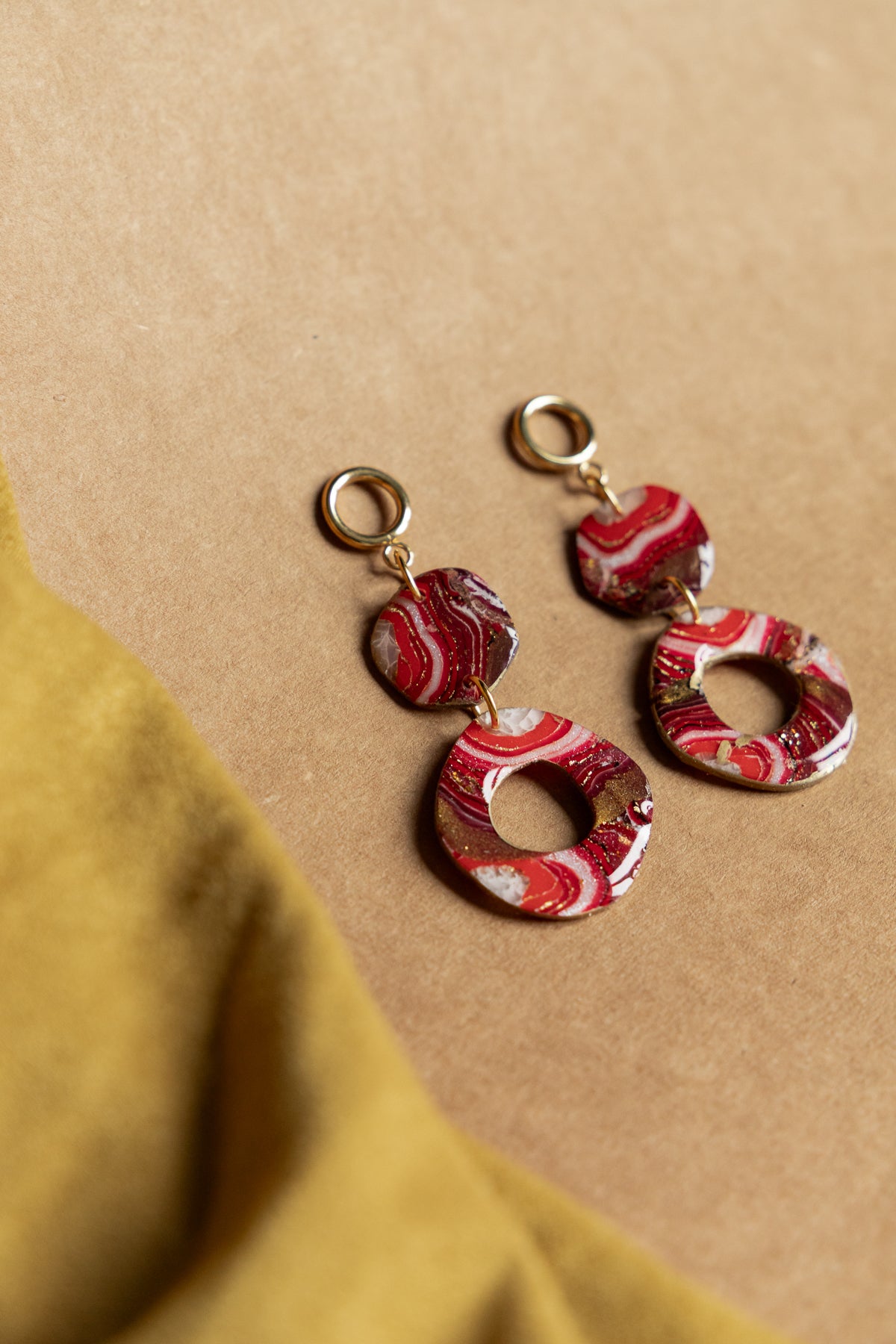Oorbellen | Faux agate red rounds
